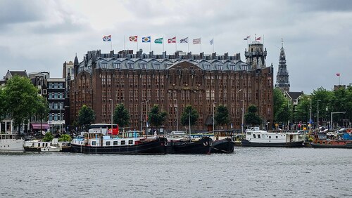 Audioguida di Amsterdam: esplora il Grand Hotel Amrâth Amsterdam